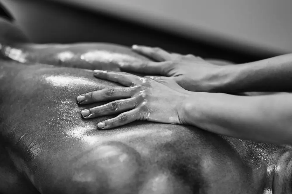 Slow tantric massage with warm oil at our Marbella centre